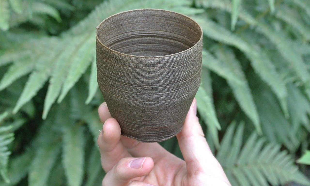 bamboo cup in hand environmental bamboo cup in hand environmental