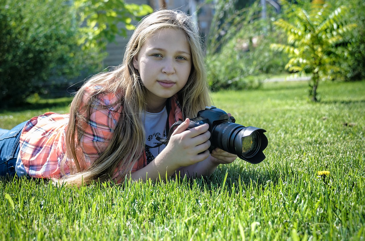 girl photographing nature girl photographing nature